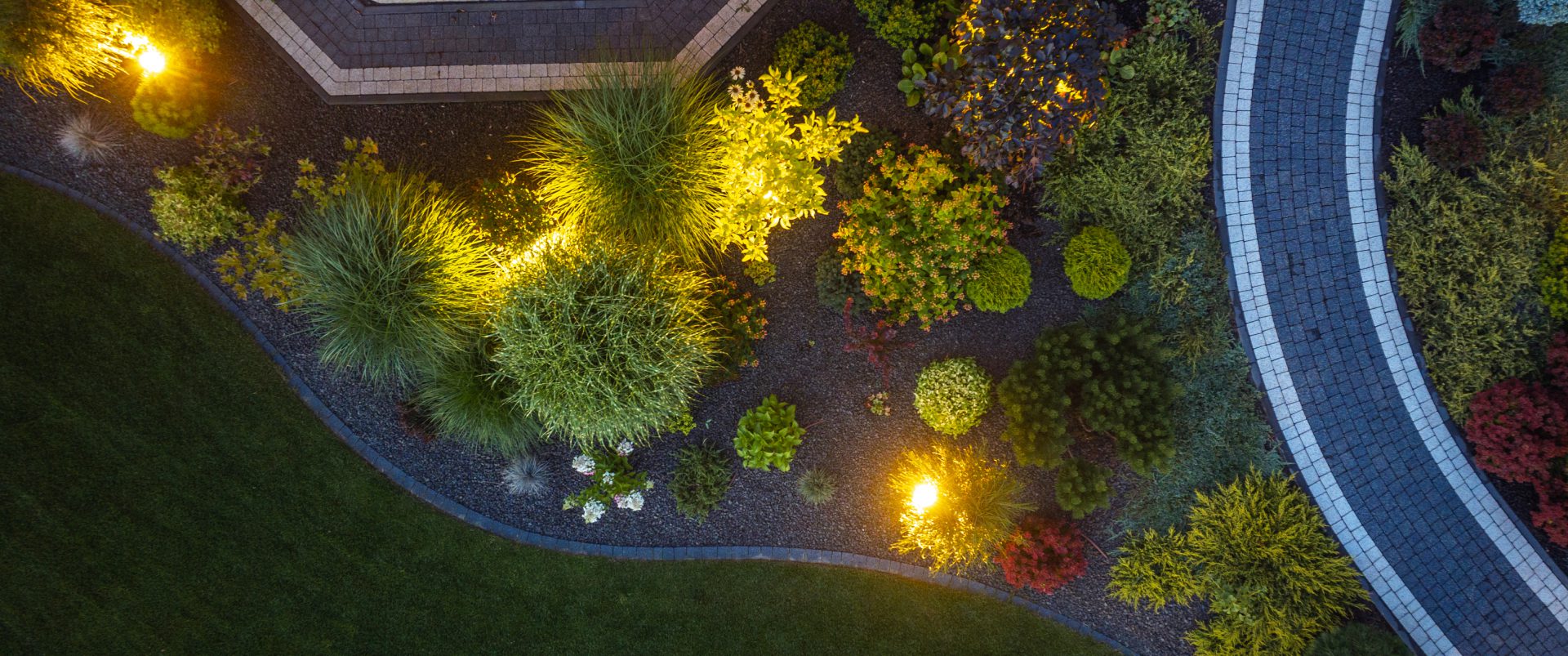Aerial view of illuminated garden landscaping.